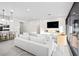 Contemporary living space featuring an open concept design and neutral furniture at 717 Monroe Hill Pl, Henderson, NV 89011