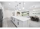 Open concept living space with stainless steel appliances and casual dining at 717 Monroe Hill Pl, Henderson, NV 89011