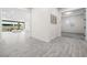 Open living space featuring wood-look floors and neutral color palette at 717 Monroe Hill Pl, Henderson, NV 89011