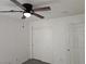 Bedroom with ceiling fan, plush carpeting and a closet at 7461 Enviable Ct, Las Vegas, NV 89149