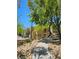 Scenic view of condo along sidewalk, showcasing the community's inviting atmosphere and desert landscaping at 7461 Enviable Ct, Las Vegas, NV 89149