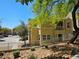 Inviting condo featuring a private balcony and manicured desert landscape in a desirable community at 7461 Enviable Ct, Las Vegas, NV 89149