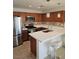 Bright kitchen featuring stainless steel appliances, a breakfast bar, and modern pendant lighting at 7461 Enviable Ct, Las Vegas, NV 89149