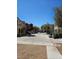 Quiet suburban street featuring well-maintained homes, mature trees, and a welcoming neighborhood atmosphere at 7461 Enviable Ct, Las Vegas, NV 89149