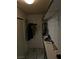 Spacious walk-in closet with shelving, hanging rods, and tiled floor at 7461 Enviable Ct, Las Vegas, NV 89149