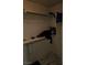Organized walk-in closet with shelving and marble-patterned tile flooring at 7461 Enviable Ct, Las Vegas, NV 89149