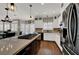 Modern kitchen with stainless steel appliances and a large center island at 7492 Midfield Ct, Las Vegas, NV 89120