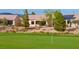 Views of back of home with golf course; serene spot for relaxing and enjoying the outdoors at 7509 Chaffinch St, North Las Vegas, NV 89084