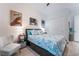 Cozy bedroom with a comfortable bed, stylish decor, and ample natural light at 778 Dainty Daffodil St, Henderson, NV 89011