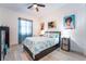 Serene bedroom with a comfortable bed, soft lighting, and tasteful wall art at 778 Dainty Daffodil St, Henderson, NV 89011