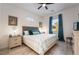 Cozy bedroom with a comfortable bed, side tables, and cool-toned accents at 778 Dainty Daffodil St, Henderson, NV 89011