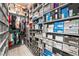 Organized walk-in closet with ample shelving, hanging space, and storage solutions at 778 Dainty Daffodil St, Henderson, NV 89011