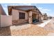 Charming single-story home with a covered front porch and stone accents, blending comfort and style at 778 Dainty Daffodil St, Henderson, NV 89011
