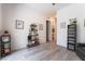 Hallway showing neutral decor and connections to other rooms in the home at 778 Dainty Daffodil St, Henderson, NV 89011