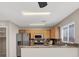 Well-equipped kitchen with stainless steel appliances, granite countertops, and ample cabinet space at 7909 Citrus Meadow Ct, Las Vegas, NV 89131