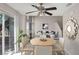Bright living room features a cozy dining area, fireplace, and modern decor at 7909 Citrus Meadow Ct, Las Vegas, NV 89131