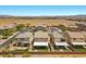 Aerial view of a home featuring a private backyard, covered patio, desert landscaping, and a neighborhood street at 8013 Green River Knob St, Las Vegas, NV 89113