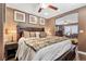 Charming bedroom with wood accents, inviting decor, and plenty of natural light at 8013 Green River Knob St, Las Vegas, NV 89113