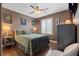Comfortable bedroom with a ceiling fan, and neutral decor at 8013 Green River Knob St, Las Vegas, NV 89113