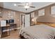 Bedroom featuring comfortable bed, work space and neutral walls at 8013 Green River Knob St, Las Vegas, NV 89113