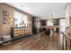 Open kitchen featuring a large island, stainless steel appliances, and dark cabinetry at 8013 Green River Knob St, Las Vegas, NV 89113