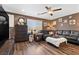 Comfortable living room featuring wood floors, stylish decor, and ample natural light at 8013 Green River Knob St, Las Vegas, NV 89113