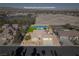Beautiful home with a three car garage, desert landscaping, tennis court, gazebo, and sparkling pool at 8228 Fulton Ranch St, Las Vegas, NV 89131