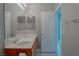 Bathroom features double sink vanity, tile floor and private toilet area at 8228 Fulton Ranch St, Las Vegas, NV 89131