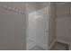 View of a walk-in closet with shelving, accessed through an interior door at 8228 Fulton Ranch St, Las Vegas, NV 89131