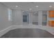 Spacious living room with neutral walls and many windows at 8228 Fulton Ranch St, Las Vegas, NV 89131