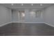 Open-concept living room with hardwood floors and recessed lighting fixtures at 8228 Fulton Ranch St, Las Vegas, NV 89131