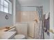 Close up of accessible walk in tub with shower and marbled vanity at 8525 Festival Dr, Las Vegas, NV 89134