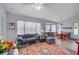 Inviting living area with large windows, comfortable seating, and stylish decor, ideal for relaxation at 8525 Festival Dr, Las Vegas, NV 89134