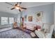 Comfortable living room showcasing stylish furniture, floral arrangements, and bright natural light at 8525 Festival Dr, Las Vegas, NV 89134