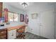 Bright office space with built-in desk, natural light, and charming decor at 8525 Festival Dr, Las Vegas, NV 89134