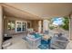 Covered patio with comfortable seating area, ideal for outdoor entertaining and relaxing at 8525 Festival Dr, Las Vegas, NV 89134