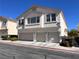 Charming two-story home with a three-car garage and stucco exterior at 8688 Tomnitz Ave # 101, Las Vegas, NV 89178