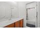 Bathroom featuring a modern vanity and bathtub/shower combination at 9457 Alma Ridge Ave, Las Vegas, NV 89178