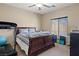 Comfortable bedroom features a ceiling fan and a window with blinds at 9457 Alma Ridge Ave, Las Vegas, NV 89178