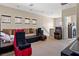 This large upstairs game room is equipped with theater seats and fun arcade games at 9457 Alma Ridge Ave, Las Vegas, NV 89178