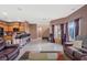 Bright living space with tile floors, inviting furniture, and an open layout at 9457 Alma Ridge Ave, Las Vegas, NV 89178