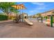 Community playground with a slide, perfect for outdoor fun and recreation at 9457 Alma Ridge Ave, Las Vegas, NV 89178