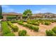 Community playground with a covered picnic pavilion surrounded by manicured landscaping and walking paths at 9457 Alma Ridge Ave, Las Vegas, NV 89178