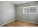 Bedroom with neutral walls and hardwood flooring at 9535 Golden Scots Ct, Las Vegas, NV 89123