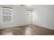 This bedroom is bright, with natural light and hardwood flooring at 9535 Golden Scots Ct, Las Vegas, NV 89123