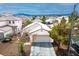 Inviting home with a spacious driveway, mature trees, and a well-kept front yard at 9535 Golden Scots Ct, Las Vegas, NV 89123