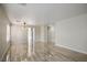 Bright living room featuring tile floors, neutral paint, and ample natural light at 9535 Golden Scots Ct, Las Vegas, NV 89123