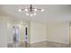 Large living space featuring tile floors, neutral paint, and access to other rooms at 9535 Golden Scots Ct, Las Vegas, NV 89123