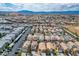 Overview of a community featuring similar homes in a well-planned neighborhood and mountain views at 9535 Golden Scots Ct, Las Vegas, NV 89123