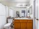 Bathroom with granite countertops, tile flooring and a large mirror at 988 Flapjack Dr, Henderson, NV 89014